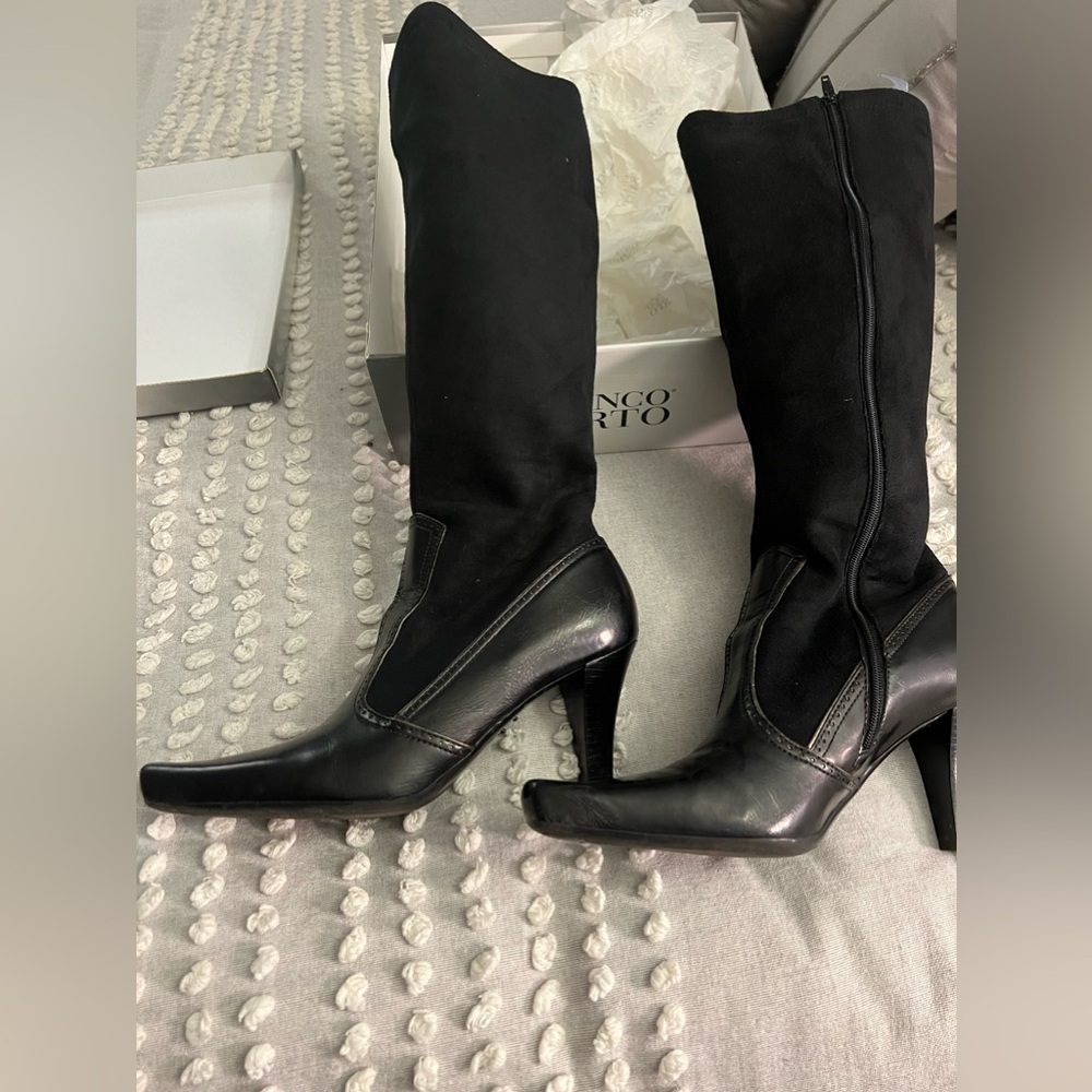 Women’s black heeled leather and suede boots
